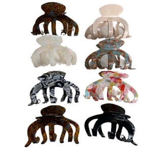 Large acetate hair claw clips in various colors and patterns for women's hair styling