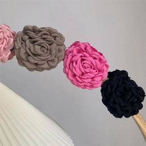 Artistic linen fabric rose flower hair claw clip with dried rose texture and multi-color petals