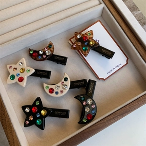 Barrettes à Cheveux Étoile Lune en Acétate et Strass Cristal Coloré Clips Latéraux Bec de Canard Style Coréen Élégant