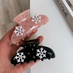 Pinces à cheveux flocons de neige avec strass rose et noir pour coiffures d'hiver