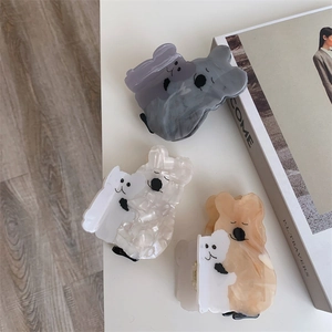 Lot de trois pinces à cheveux koala en acétate avec des motifs marbrés élégants