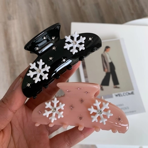Pinces à cheveux flocon de neige élégantes avec strass en noir et rose clair