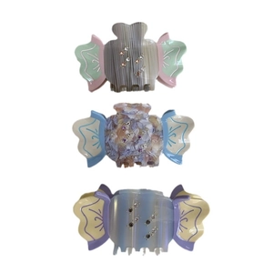 Three-piece set of butterfly-shaped acetate hair claws with rhinestones in pastel colors