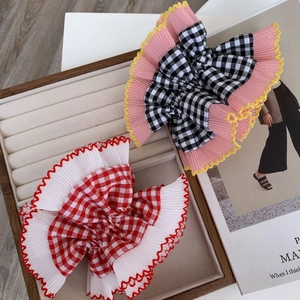 Lace oversized scrunchies with retro plaid patterns and ruffled edges in pink and white