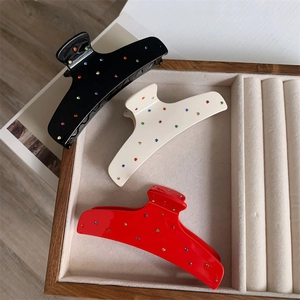 Minimalist acetate hair claw clips with colorful rhinestones in red, black and white