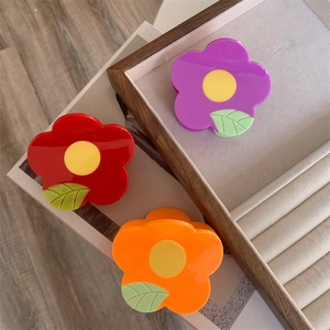 Three-piece set of colorful flower hair claws in red, purple and orange acrylic