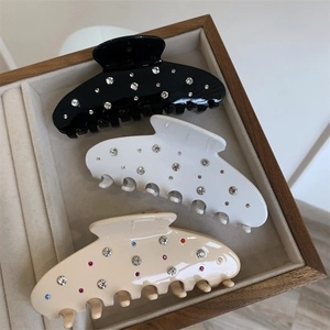 Trois grandes pinces à cheveux Y2K noir blanc et beige avec strass étincelants