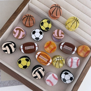Set de pinzas para el cabello con diseño de balones de baloncesto y fútbol