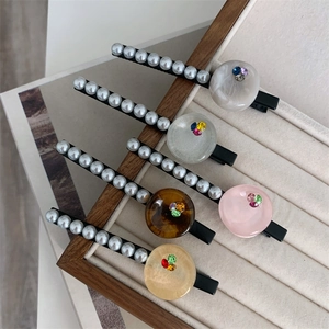 Elegant pearl hair clip set with resin accents and sparkling rhinestones for women