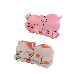 Cute pink pig and calico cat hair claws made of glossy acrylic for stylish hair styling
