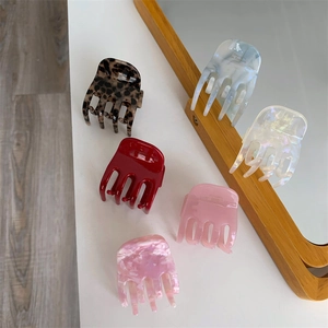 Set of 5 acetate hair claws in leopard and colorful patterns with Barrette La France gold logo