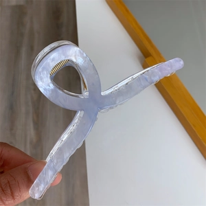 Detail of 13cm lilac marble acrylic hair claw clip with strong spring for thick hair