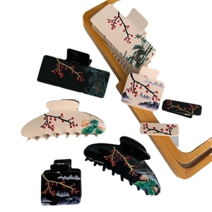 Pinces à cheveux style peinture à l'encre avec motifs bambou et strass sur blanc