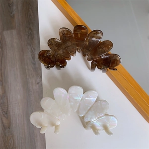 Exquisite large acetate petal hair claws in amber brown and pearlescent white set