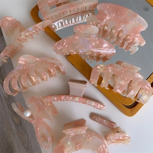 Pink marble acetate hair claw clip collection for women with elegant pearl accents
