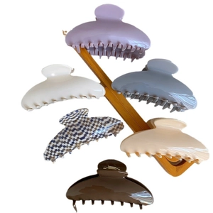 Thickened acetate large hair claw clips set in six assorted colors on wooden stand