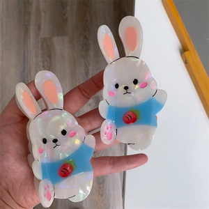 Set of two cute acetate bunny hair claws with pearlescent finish and carrot shirt design