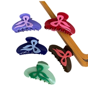 Pinces à cheveux en acétate avec nœud en couleurs vives comme violet, bordeaux et menthe