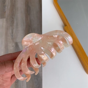 Pink marble acetate hair claw clip with pearlescent finish for women daily hair styling