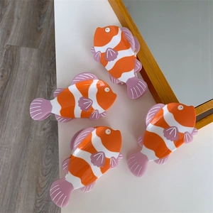 Set di mollette per capelli a forma di pesce pagliaccio in acetato arancione e viola
