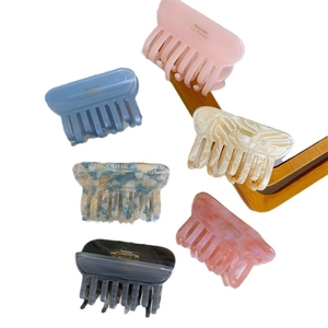 Set of 6 minimalist acetate hair claws in various marble and solid colors for women