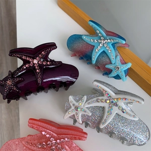 Starfish bow claw clips with sparkling rhinestones in assorted colors for hair styling