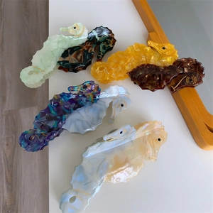 Seahorse acetate hair claw set in marble texture for marine collection hair styling