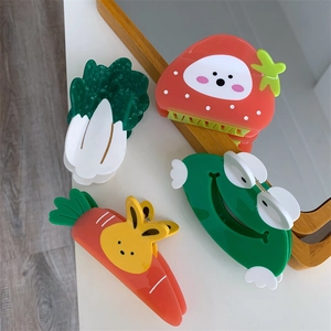 Charming acetate hair claws featuring strawberry, cabbage, rabbit, and frog designs