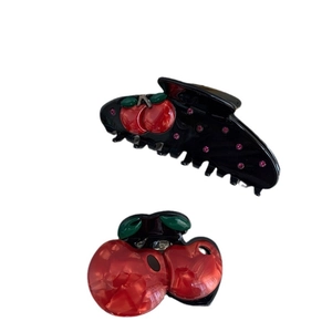 Set of creative cherry claw clips with pink rhinestones and red marble texture pattern