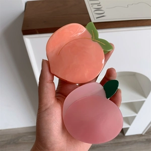 Détails des pinces à cheveux en acétate en forme de pêche, tons rose et orange