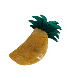Pince à cheveux chic en forme d'ananas en acétate marbré jaune à feuilles vertes