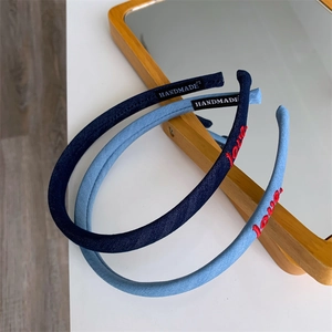Minimalist denim headband with red love heart embroidery and handmade cloth label