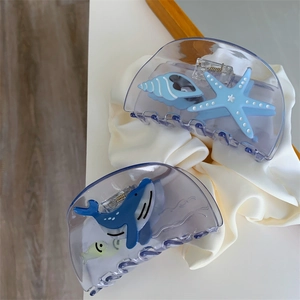 Translucent blue ocean series hair claw clips with starfish and whale motifs for women