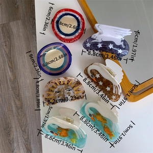 Detailed size chart for various acetate hair claws in swan, moon, and fish designs