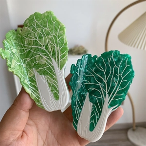 Detailed macro view of creative Chinese cabbage hair claw made of premium acetate fiber