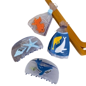Creative ocean-themed transparent acetate hair claws featuring goldfish and whale designs