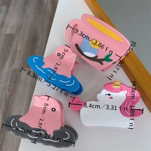 Detailed size specifications for pink dolphin and unicorn acetate hair claw clips
