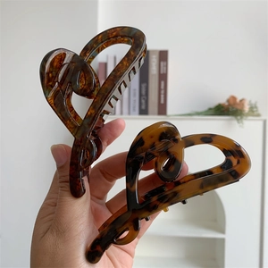 Large tortoiseshell heart hair claw clips in acetic acid for thick hair styling