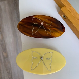 Creative geometric oval hair clip set with butterfly bead patterns and shiny rhinestones