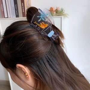 Unique acetate water bottle hair claw clip featuring starfish and tropical fish motifs