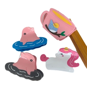 Cute pink acetate hair claw clips featuring dolphin unicorn and coffee cup designs