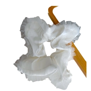 Elegant white French satin scrunchie with layered lace edges and a creative square design