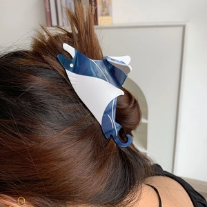 Unique stingray hair claw clip made of blue and white acetate for women's hairstyles