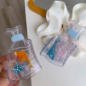 Creative acetate hair clips featuring goldfish and dolphin in transparent bag design