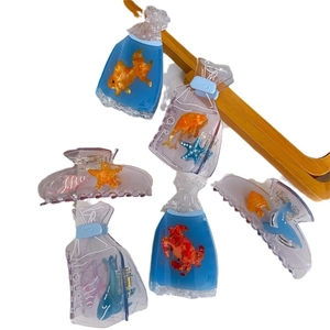 Summer ocean series acetate hair claws featuring starfish and goldfish designs