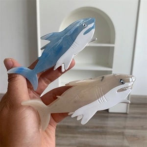 Marine life shark shaped acetate hair claw clips in blue gradient and marble cream finishes