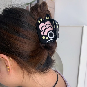 Creative bear paw hair claw clip in glossy black acetate for elegant styling