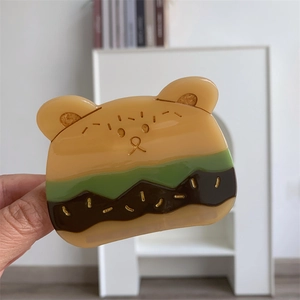 Pinza para el pelo con forma de oso, colores de hamburguesa y detalles de purpurina dorada