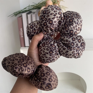 Set of two velvet leopard print scrunchies with a stylish floral ruffled design for women