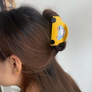 Cute yellow car-shaped acetate hair claw clip with cartoon bunny design for women